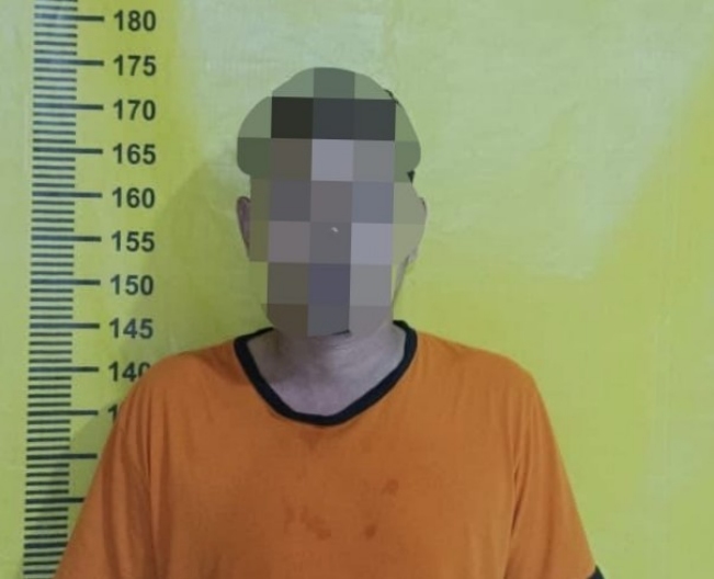 UA (33) Penjual Obat Keras Tanpa Izin Saat Diamankan Polsek Teluknaga.